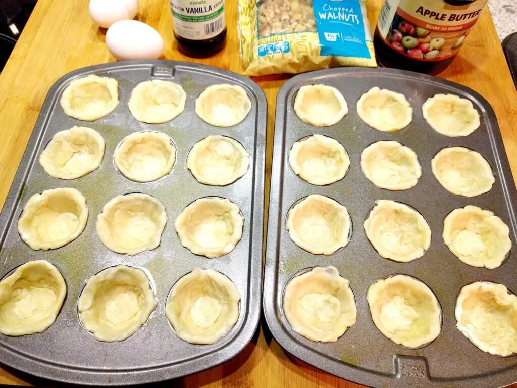 Moms Pecan Tart Golden Cups Recipe Dough in cookie trays
